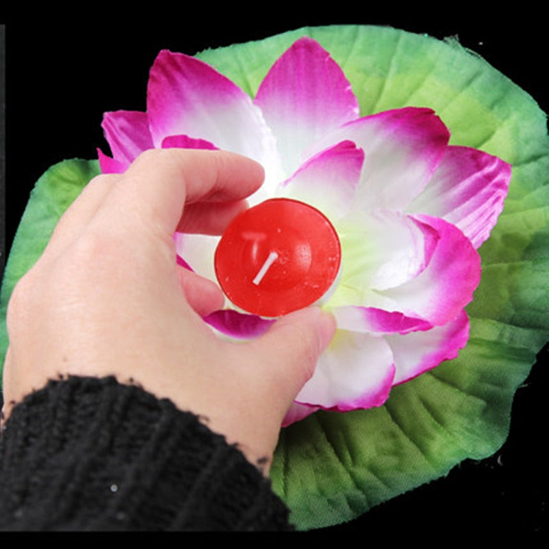 wishing  water floating candle light