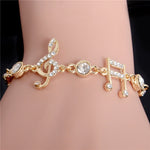 GOLD COLOR BRACELET- MUSICAL NOTES